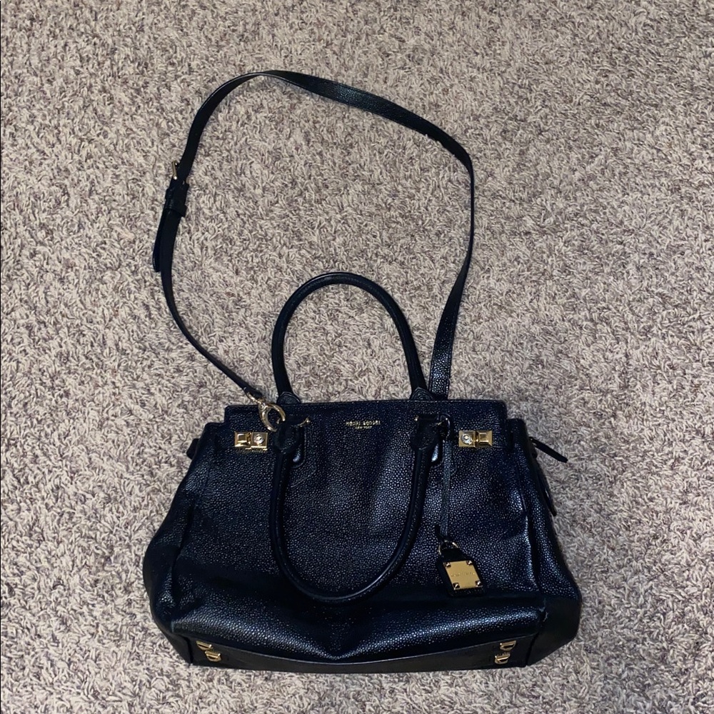 Henri Bendel black purse with handle and strap. Gold details